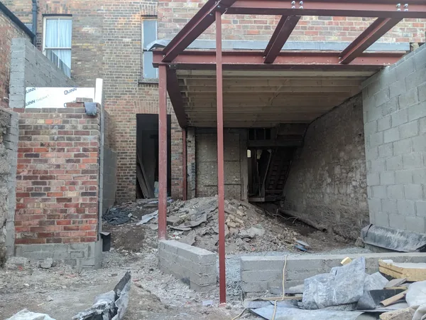 Extension frame with red steel beams